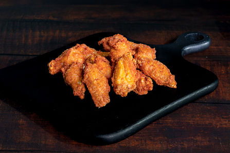 Halal chicken wings at Canadian Pizza Unlimited Edmonton in multiple flavours